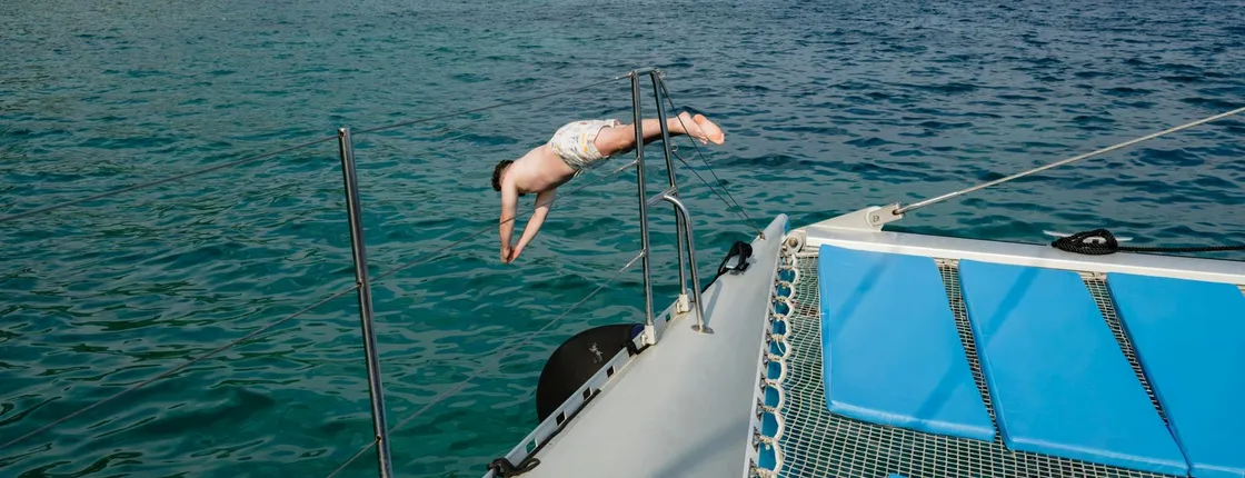 Corfu catamaran cruise with Greek lunch, drinks and optional transfers