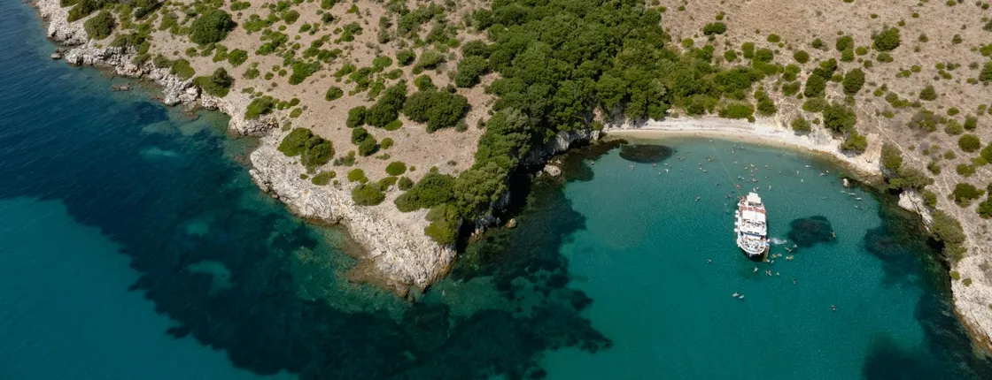 Boat trip from Corfu to Sivota with local lunch, Blue Lagoon and optional transfers