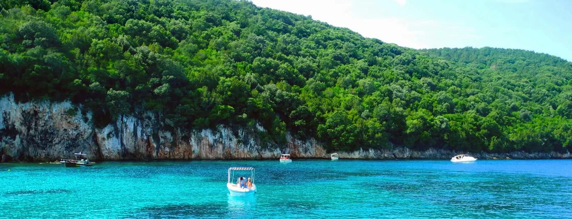 Boat trip from Corfu to Sivota with local lunch, Blue Lagoon and optional transfers