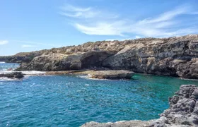 Siracusa 1-hour boat tour around Ortigia and sea caves adventure